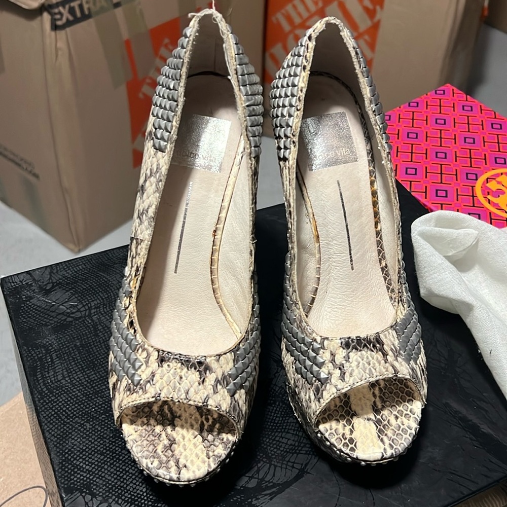 Used but still in good condition. Comes with dust bag. Gray /silver